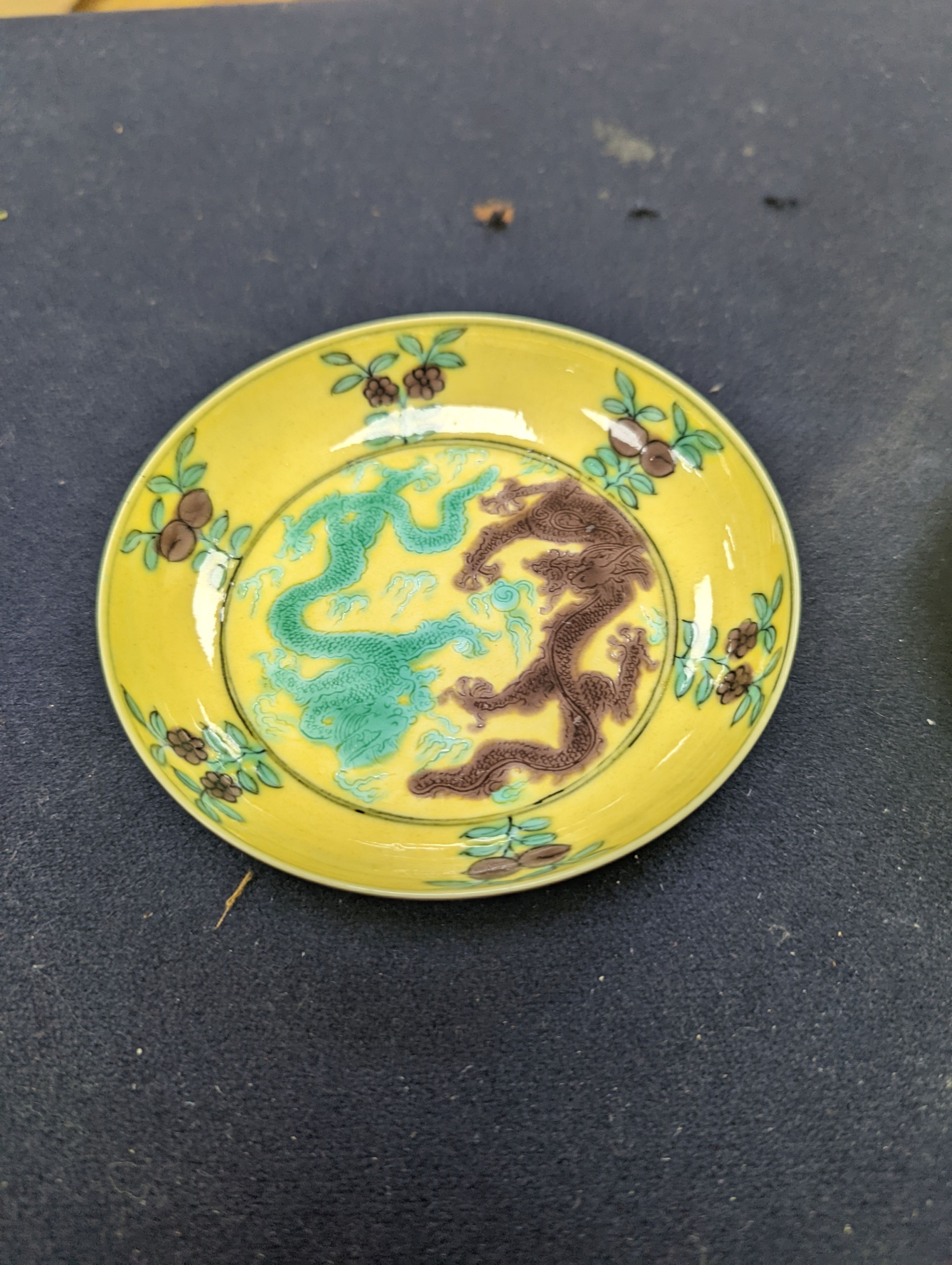 A pair of Chinese yellow, green and aubergine dragon dishes, Guangxu marks, 10cm.